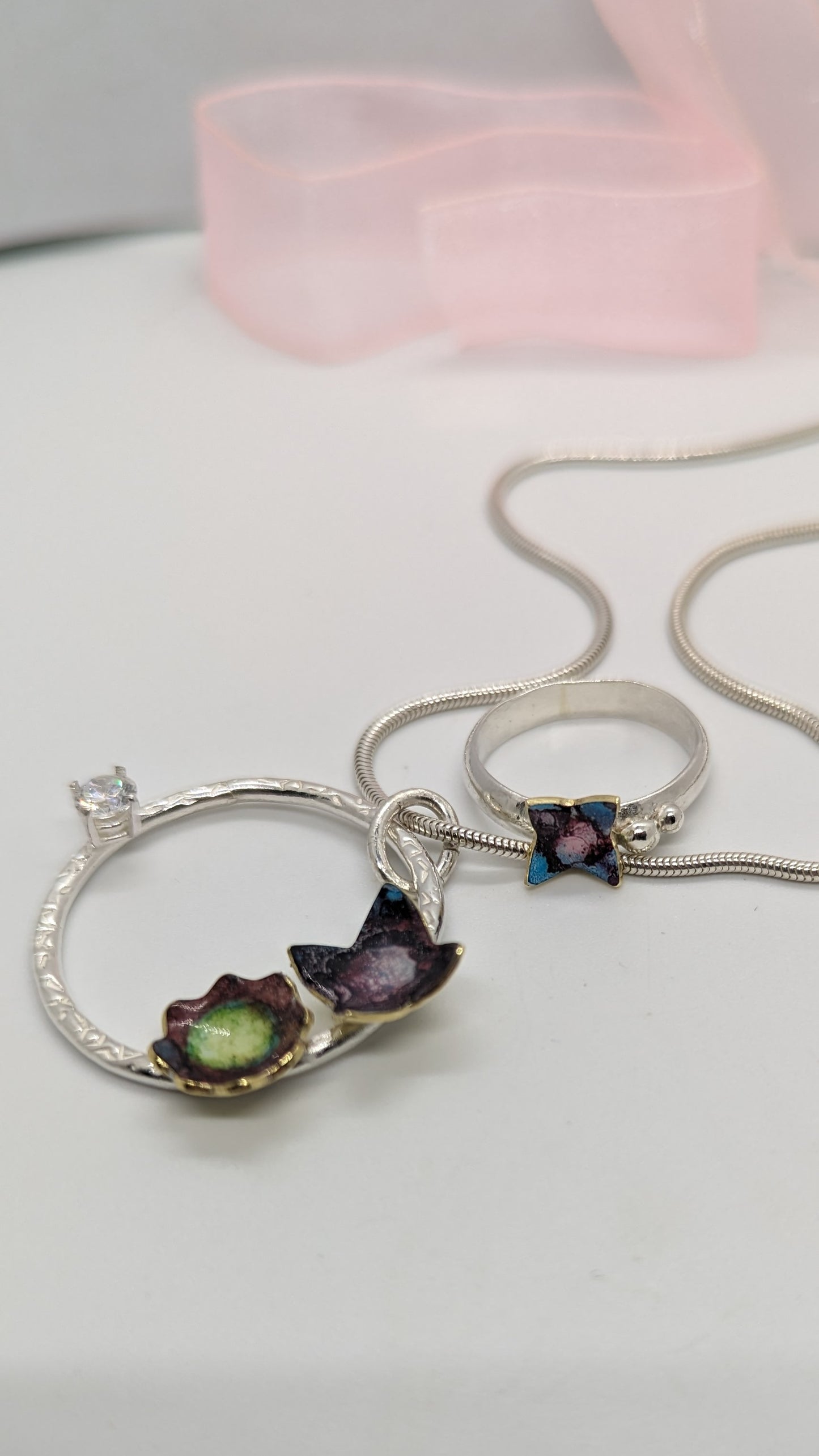 Sterling Silver necklace, with floral enamelled cups with crystal clear cubic zirconia