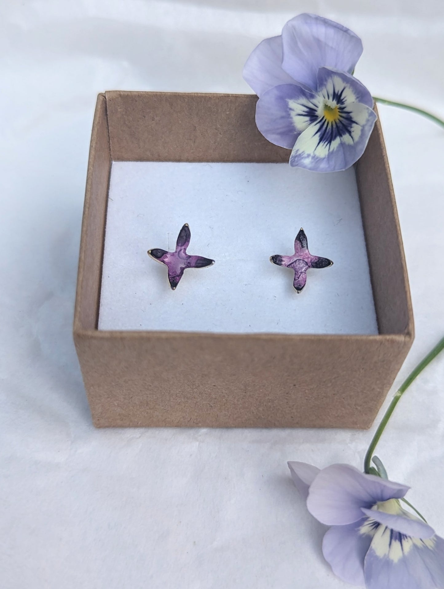 'Theia's Garden' Purple Star Stud Earrings. Displayed in Jewellery box